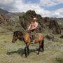 Wladimir Putin mit nacktem Oberkörper auf einem Pferd – das Bild ist legendär