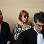 Gisele P. (C) sits beside her daughter Caroline Darian (L) and her son at the courthouse during the trial of her husband accused of drugging her for nearly ten years and inviting strangers to rape her at their home in Mazan, a small town in the south of France, in Avignon, on September 2, 2024. The case involves 50 co-defendants. The defendants, 18 of whom are on remand, are men aged between 21 and 68 at the time of the events. (Photo by Christophe SIMON / AFP)