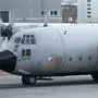 One   the three Belgian Hercules C-130 military cargo aircraft stands on the tarmac  to repatriate the bodies of victims after a tourist bus from Belgium crashed in a tunnel of the motorway A9,near Sierre, Switzerland, at Sion airport, western Switzerland, Thursday, March 15, 2012. Twenty-eight people, including 22 children, returning to Belgium from a skiing holiday died in a bus accident in Sierre. . (AP Photo/Keystone/Laurent Gillieron)
