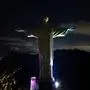 The statue of Christ the Redeemer is pictured before being plunged into darkness for the Earth Hour environmental campaign on top of Corcovado hill in Rio de Janeiro, Brazil, on March 22, 2025. (Photo by MAURO PIMENTEL / AFP)