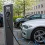 (FILES) This file photo taken on April 30, 2019 shows electric cars being charged on a street in the Norwegian capital Oslo. - In 2020, Norway became the first country in the world where electrics cars accounted for more than 50 percent of new cars registered, according to figures published Tuesday, January 5, 2021 by an industry group. (Photo by Jonathan NACKSTRAND / AFP)