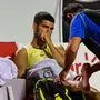 Spain's Carlos Alcaraz gestures after suffering an injury during the ATP 500 Rio Open tennis match against Brazil's Carlos Monteiro in Rio de Janeiro, Brazil on February 20, 2024. (Photo by Pablo PORCIUNCULA / AFP)