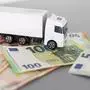 white toy truck on euro banknotes. concept for logistics, transportation and and finance. High quality photo