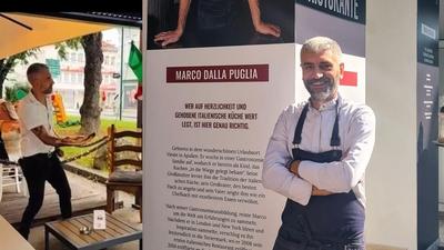 Marco Urbano, links kurz vor dem viralen Pizzawurf