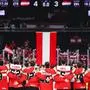 TAMPERE,FINLAND,22.MAY.23 - ICE HOCKEY - IIHF Ice Hockey World Championship 2023, group stage, Austria vs Hungary. Image shows the Austrian flag and players.
Photo: GEPA pictures/ Daniel Goetzhaber