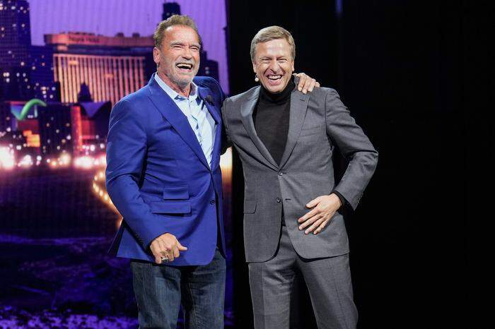 Arnold Schwarzenegger und BMW-Chef Oliver Zipse