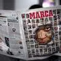 A picture taken in Madrid on February 20, 2024 shows a Spanish daily sport newspaper Marca's cover showing an image of Paris Saint-Germain's French forward Kylian Mbappe amid a combination of several Marca's covers. France captain Mbappe, 25, has told the French side he will leave at the end of the season, a source close to PSG told AFP on February 17. Superstar striker Mbappe is heavily linked with Madrid, who have tried to sign him multiple times in the past few years and may finally get their man. (Photo by Thomas COEX / AFP)
