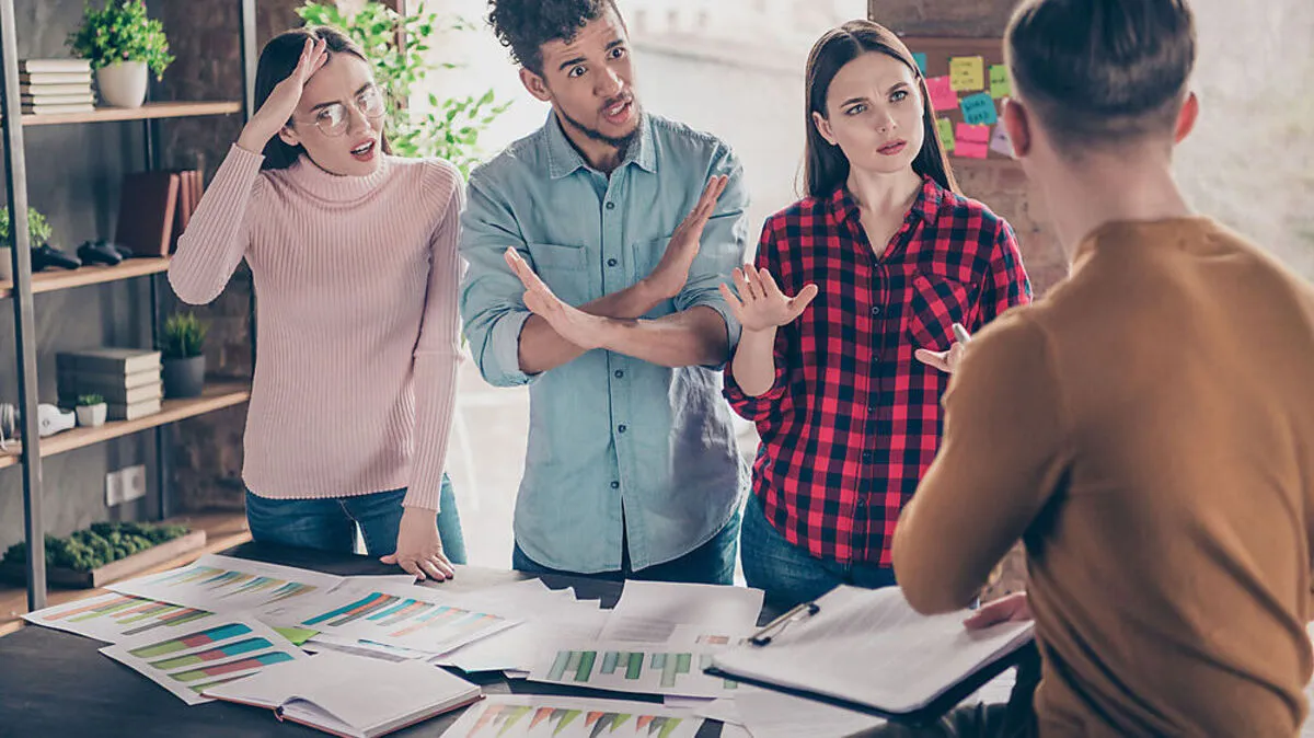 pPortrait of millennial youth annoyed irrtiated have misunderstanding disppute briefing scream shout briefing look wear checked shirt blue red pullover sweater stand loft industrial interior