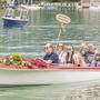 Sogar Boote wurden für den großen Kirchtagsumzug direkt am Wörthersee festlich geschmückt