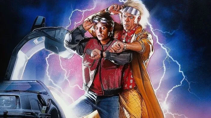 Bekannte Zeitreisende in der "Zurück in die Zukunft"-Trilogie: Marty McFly (gespielt von Michael J. Fox) und  Dr. Emmett "Doc" Brown (dargestellt von Christopher Lloyd)