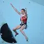 Austria's Jessica Pilz reacts after competing in  the women's sport climbing lead final during the Paris 2024 Olympic Games at Le Bourget Sport Climbing Venue in Le Bourget on August 10, 2024. (Photo by Fabrice COFFRINI / AFP)