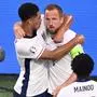 England's forward #09 Harry Kane celebrates with England's midfielder #10 Jude Bellingham after scoring his team's first goal during the UEFA Euro 2024 semi-final football match between the Netherlands and England at the BVB Stadion in Dortmund on July 10, 2024. (Photo by Kirill KUDRYAVTSEV / AFP)
