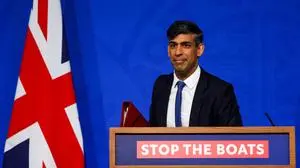 Britain's Prime Minister Rishi Sunak reacts as he speaks during a press conference, at the Downing Street Briefing Room, in central London, on April 22, 2024 regarding the Britain and Rwanda treaty to transfer illegal migrants to the African country. Rishi Sunak promised on April 22, 2024 that deportation flights of asylum seekers to Rwanda will begin in "10 to 12 weeks", as the plan entered its final stage in parliament. (Photo by Toby Melville / POOL / AFP)