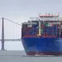 FILE - In this Tuesday, May 14, 2019 file photo, a Cosco Shipping container ship passes the Golden Gate Bridge in San Francisco bound for the Port of Oakland. The United States and China are raising tariffs on tens of billions of dollars' worth of each other's imports, escalating a trade war, spooking financial markets and casting gloom over the prospects for the world economy. (AP Photo/Eric Risberg)