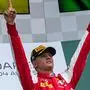 Prema Racing's German driver and winner Mick Schumacher celebrates on the podium after winning the Formula Two championship race of the Hungarian Grand Prix at the Hungaroring circuit in Mogyorod near Budapest, Hungary, on August 4, 2019. (Photo by ANDREJ ISAKOVIC / AFP)