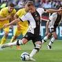 Germany's midfielder Joshua Kimmich prepares to kick the ball in a penalty shootout to score the 3-3 goal during the International Friendly football match between Germany and Ukraine, in Bremen, northern Germany on June 12, 2023. (Photo by Focke Strangmann / AFP)