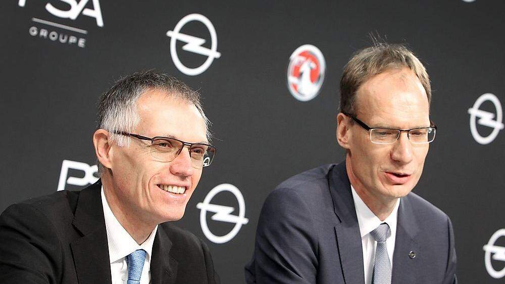 PSA-Chef Carlos Tavares und Opel-Vorstand  Michael Lohscheller