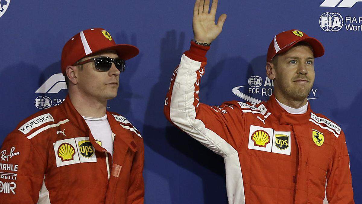 Sebastian Vettel (rechts) und Kimi Räikkönen