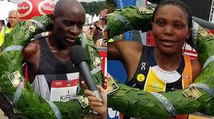 Peter Kirui und Viola Jelagat, die stolzen Gewinner des Halbmarathons im Rahmen von Kärnten Läuft