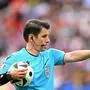 Turkish referee Umut Meler gestures  during the UEFA Euro 2024 Group E football match between Belgium and Slovakia at the Frankfurt Arena in Frankfurt am Main on June 17, 2024. (Photo by Kirill KUDRYAVTSEV / AFP)