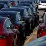 (FILES) In this file photo taken on April 20, 2020 newly manufactured Tesla electric cars are pictured in a storage area at The Western Docks in Southampton on April 20, 2020, as life in Britain continues during the nationwide lockdown to combat the novel coronavirus pandemic. - Britain's battered automotive sector, already beset with Brexit woes, is struggling to restart from the coronavirus crisis with some 2,000 jobs axed on Thursday in the face of slumping sales. (Photo by ADRIAN DENNIS / AFP)