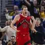 Toronto Raptors center Jakob Poeltl reacts after being charged with a foul during the second half of an NBA basketball game against the Golden State Warriors, Thursday, March 20, 2025, in San Francisco. (AP Photo/Godofredo A. Vásquez)
