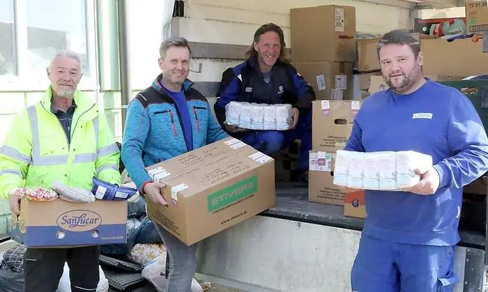 Vasile Haraga mit seinem Chef Helmut Wallner und den Arbeitskollegen Wilfried Fritz und Ingo Schöffmann (von links)