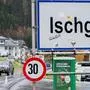 A city sign of the Tyrolean ski resort of Ischgl is pictured on a rainy day, in Ischgl, Austria, on October 29, 2020. - Austria's ski lifts may be reopening on December 24, 2020, but as the country struggles to control coronavirus infections, the sector is expecting a subdued season -- and the thousands of migrant workers who depend on it are facing an uncertain winter. Ischgl, the village that became one of Europe's first, large-scale coronavirus clusters, is at least part of the reason many of those workers are now unemployed. (Photo by JOE KLAMAR / AFP)