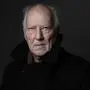 German filmmaker, actor, opera director, and author, Werner Herzog, poses during a photo session in Paris, on December 12, 2024. (Photo by JOEL SAGET / AFP)