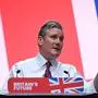 (FILES) Britain's main opposition Labour Party leader Keir Starmer delivers his keynote address to delegates on the third day of the annual Labour Party conference in Liverpool, northwest England, on October 10, 2023. Britain's Labour party gathers for its annual conference on Sunday, buoyed by being back in power for the first time in 14 years but already under pressure on several fronts. (Photo by Oli SCARFF / AFP)