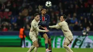 Paris Saint-Germain's French forward #29 Bradley Barcola vies for the ball with Salzburg's Bosnian defender #70 Amar Dedic and Salzburg's Argentine midfielder #07 Nicolas Capaldo during the UEFA Champions League football match between FC RB Salzburg and Paris Saint-Germain in Salzburg, Austria on December 10, 2024. (Photo by Franck FIFE / AFP)