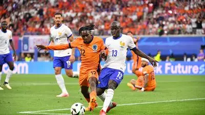 LEIPZIG,GERMANY,21.JUN.24 - SOCCER - UEFA EURO 2024, group stage, Netherlands vs France. Image shows Jeremie Frimpong (NED) and N Golo Kante (FRA).
Photo: GEPA pictures/ Icon Sport/ FEP/ Anthony Bibard - ATTENTION - COPYRIGHT FOR AUSTRIAN CLIENTS ONLY