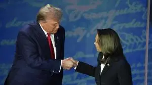 FILE - Republican presidential nominee former President Donald Trump, left, and Democratic presidential nominee Vice President Kamala Harris shake hands before the start of an ABC News presidential debate, Sept. 10, 2024, in Philadelphia. (AP Photo/Alex Brandon, File)