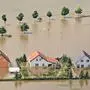 Houses stand in a flooded area by river Elbe in the enclosed village Fischbeck, central Germany, Tuesday, June 11, 2013. Weeks of heavy rain this spring have sent the Elbe, the Danube and other rivers such as the Vltava and the Saale overflowing their banks, causing extensive damage in central and southern Germany, the Czech Republic, Austria, Slovakia and Hungary. (AP Photo/Jens Meyer)