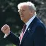 US President Donald Trump gestures as he walks to Marine One as he departs from the South Lawn of the White House in Washington, DC, on November 5, 2025. Donald Trump is traveling to Miami to speak at the America Business Forum. (Photo by SAUL LOEB / AFP)