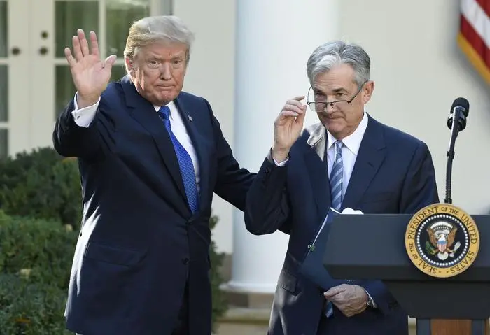 (FILES) US President Donald Trump (L) signals the end of ceremony after announcing Jerome Powell (R) as nominee for Chairman of the Federal Reserve in the Rose Garden of the White House in Washington, DC, November 2, 2017. US President Donald Trump escalated his attacks on Federal Reserve chair Jerome Powell on April 21, 2025, berating the head of the fiercely independent central bank for not cutting interest rates -- days after threatening his job. Using a pejorative nickname for the powerful banker, Trump posted on social media that 