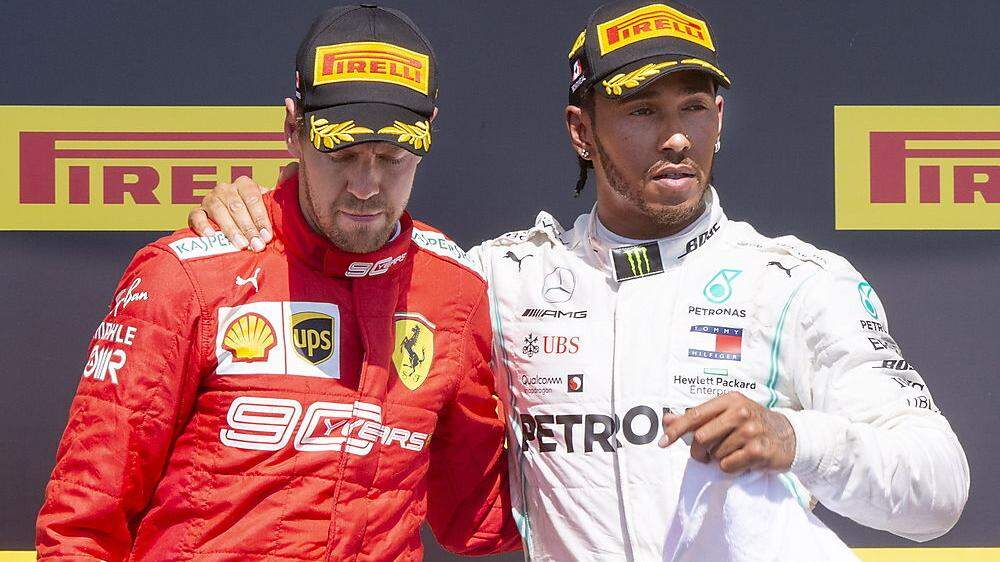 Sebastian Vettel (links) mit Lewis Hamilton