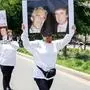 June 14, 2025, Dallas, Texas, USA: Two women holding images of Donald Trump and convicted sex trafficker Jeffrey Epstein who committed suicide in prison, during the No Kings protest in downtown Dallas Texas on Saturday. Dallas USA - ZUMAca3_ 20250614_znp_ca3_017 Copyright: xJaimexCarrerox