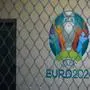 A sign for the Union of European Football Associations EURO 2020 is pictured at the headquarters of the European football's governing body UEFA in Nyon on March 17, 2020, amid spread of novel coronavirus, COVID-19. - UEFA has proposed postponing the European Championship, due to take place across the continent in June and July this year, until 2021 at crisis meetings on Tuesday, a source close to European football's governing body told AFP. (Photo by Fabrice COFFRINI / AFP) (Photo by FABRICE COFFRINI / AFP)