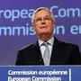 (FILES) In this file photo taken on March 5, 2020 European Commission's Head of Task Force for Relations with Britain Michel Barnier gives a press conference as he reports on the first round of EU-Britain negociations at the EU headquarters in Brussels. - The EU's chief Brexit negotiator Michel Barnier has the coronavirus, he announced on March 19, 2020. "I tested positive yesterday for Covid-19. I'm as well as I can be, strictly confined to my home," Barnier, 69, said in a video posted on his Twitter account. "I'm fine, morale is good," he added. (Photo by Franois WALSCHAERTS / AFP)