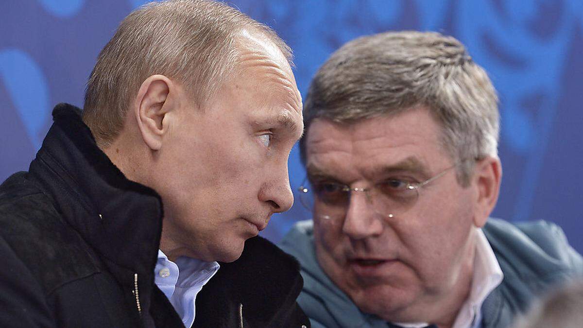 Russlands Präsident Wladimir Putin und IOC-Präsident Thomas Bach