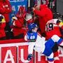 Slovakia’s forward #88 Martin Chromiak and Austria’s forward #19 Vinzenz Rohrer vie for the puck during the IIHF Men's Ice Hockey World Championship match between Austria and Slovakia in Stockholm, on May 12, 2025. (Photo by Jonathan NACKSTRAND / AFP)