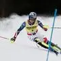 France's Clement Noel speeds down the course during an alpine ski, men's World Cup slalom, in Alta Badia, Italy, Monday, Dec. 22, 2025. (AP Photo/Gabriele Facciotti)