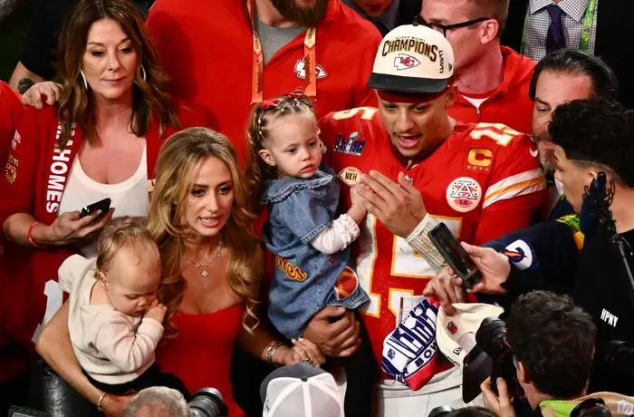Kansas City Chiefs' quarterback #15 Patrick Mahomes with his wife Brittany Mahomes and their children Patrick Bronze and Sterling Skye celebrate winning Super Bowl LVIII against the San Francisco 49ers at Allegiant Stadium in Las Vegas, Nevada, February 11, 2024. (Photo by Patrick T. Fallon / AFP)