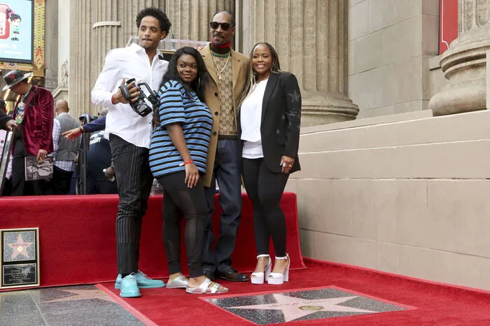 Snoop Dogg mit seinen Kindern Julian Broadus und Cori Broadus sowie mit seiner Frau Shante Broadus.