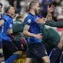 Italy players celebrate after winning the UEFA EURO 2020 final football match between Italy and England at the Wembley Stadium in London on July 11, 2021. (Photo by Frank Augstein / POOL / AFP)