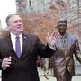 US Secretary of State Mike Pompeo is pictured next to the statue of the former US President Ronald Reagan at the Liberty square (Szabadsag) in Budapest on February 11, 2019. - Pompeo is on his one-day official visit to Hungary, the first station of his four-day official visit to Hungary, Slovakia and Poland. (Photo by ATTILA KISBENEDEK / POOL / AFP)