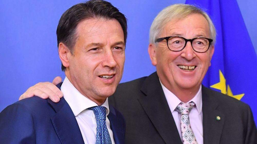 Italiens Premier Giuseppe Conte und Kommissions-Präsident Jean-Claude Juncker