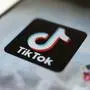 FILE - This Monday, Sept. 28, 2020, file photo, shows the TikTok logo on a smartphone in Tokyo. On Sunday, March 6, 2022, Netflix and TikTok suspended most of their services in Russia as the government cracks down on what people and media outlets can say about Russia's war in Ukraine. (AP Photo/Kiichiro Sato, File)