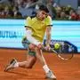 Carlos Alcaraz | Carlos Alcaraz, of Spain, returns the ball to Andrey Rublev, of Russia, during the Mutua Madrid Open tennis tournament in Madrid, Wednesday, May 1, 2024. (AP Photo/Manu Fernandez)
